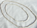 Irregular Pearl and Gold Strand Necklace